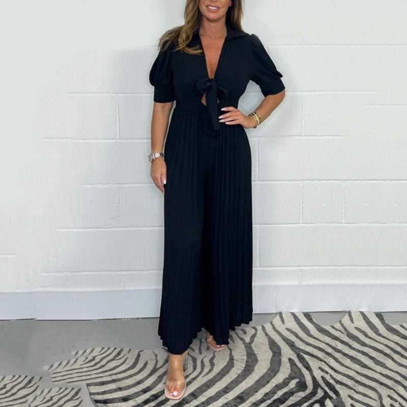 Inaya | Ensfarget plissert jumpsuit