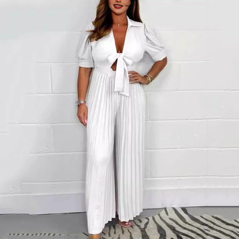 Inaya | Ensfarget plissert jumpsuit